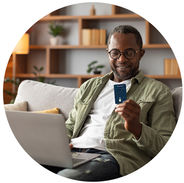 Man with First Fed Debit Card
