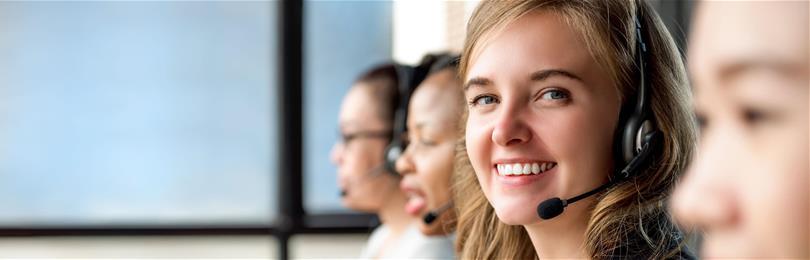 Smiling_Contact_Center_Representatives_With_Headset