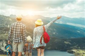 Family_Hiking_On_Top_Of_Mountain