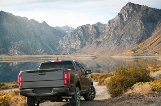 Truck_Parked_By_Lake_With_Mountain_Views