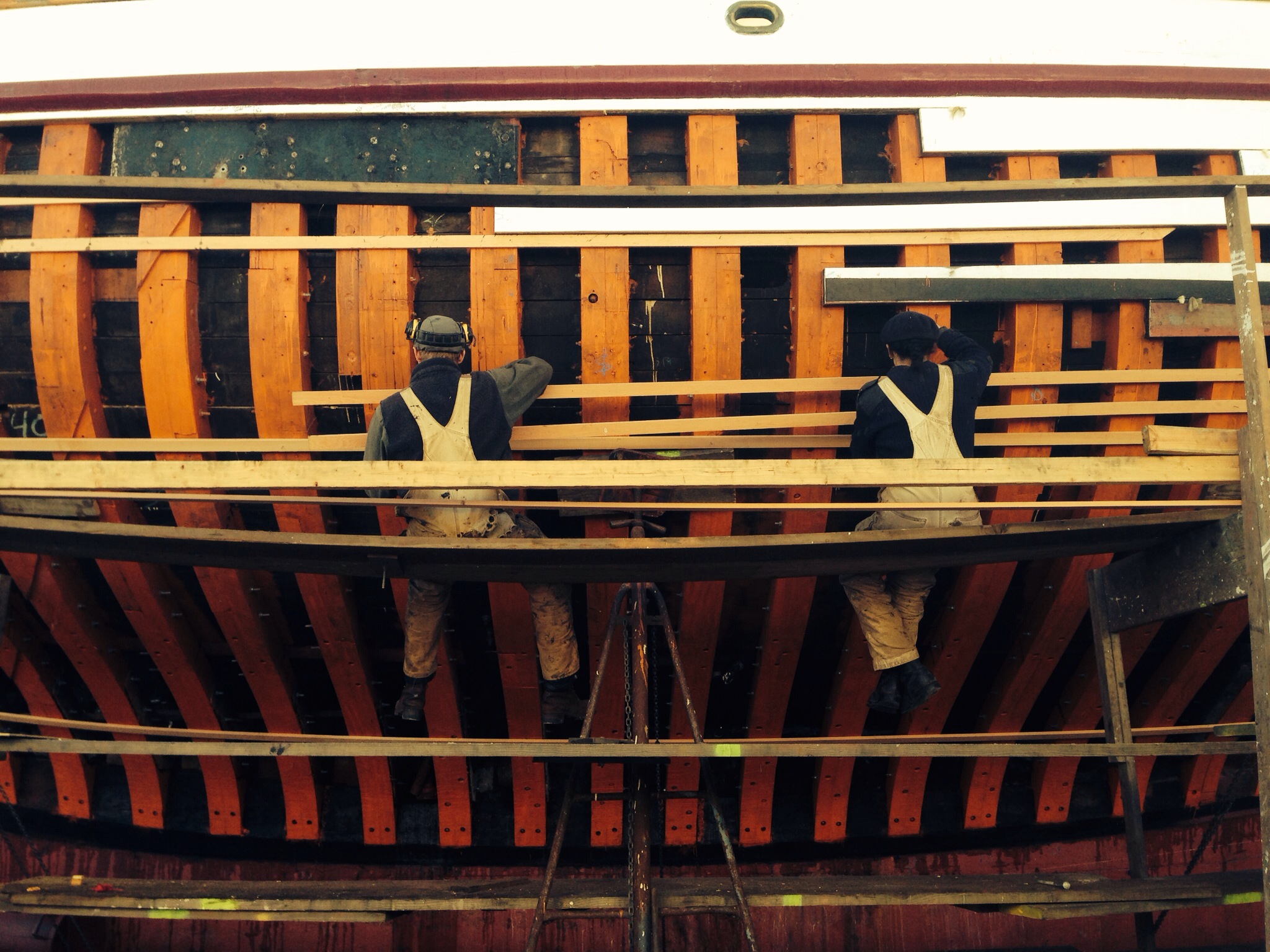 Haven Boatworks crew building a ship hull