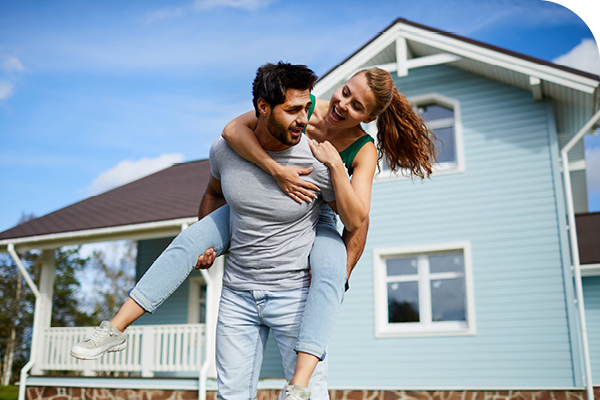 Couple Outside House