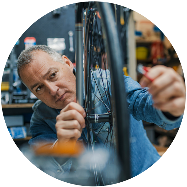 Man Fixing Bike